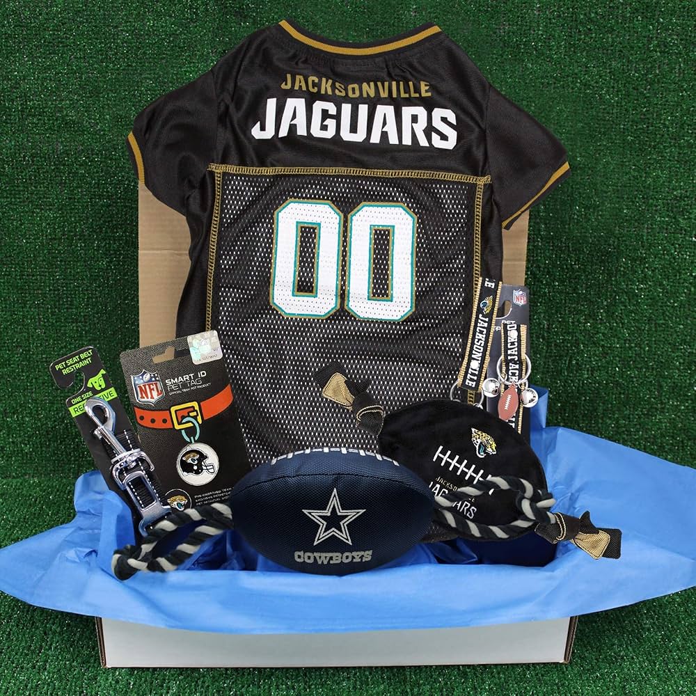 A gift box for pets featuring the Jacksonville Jaguars logo, including two licensed toys, one logo-embossed physical therapy toy, one NFL jersey, one NFL puppy training bell, and one car seat belt.